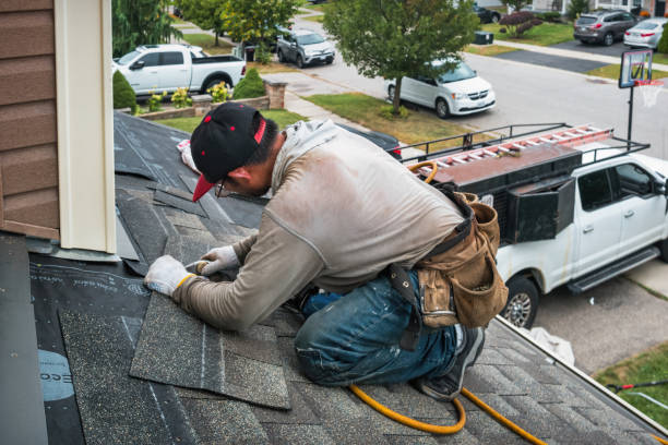 Professional Emergency Roof Repair technician working in Mohrsville, PA